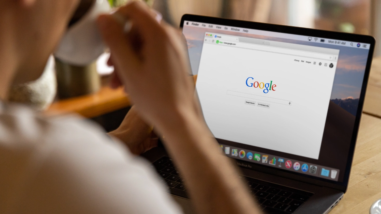 Business owner checking their Google search results on a laptop